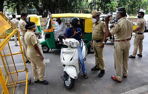Police intercept motorists during the lockdown in Bengaluru. (Photo | Ashishkrishna HP, EPS)