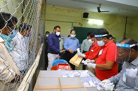 Polling officials initiate counting of votes for Khammam Corporation on Monday. (Photo | Express)