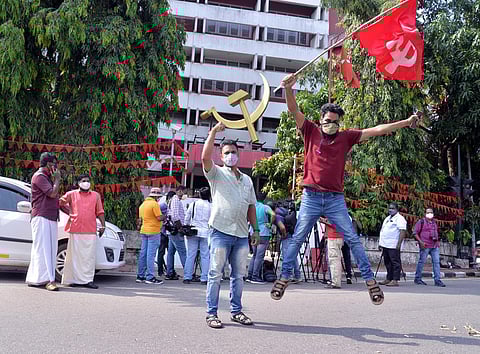 A CPM member takes out a solo celebration at the victory of the party, in front of AKG Bhavan in Thiruvananthapuram. (Photo | Vincent Pulickal, EPS)