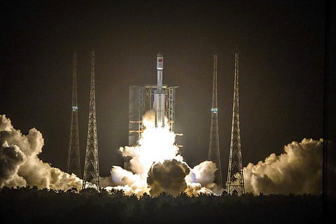 A Long March 7 rocket carrying the Tianzhou-2 spacecraft lifts off from the Wenchang Space Launch Center in Wenchang in southern China's Hainan Province. (Photo | AP)