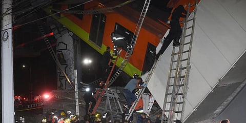 At least 23 dead, 70 injured after overpass in Mexico City metro collapses onto road