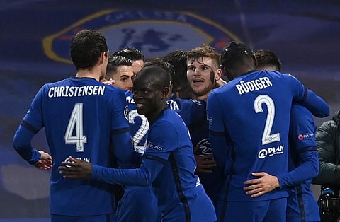 Chelsea striker Timo Werner is mobbed by teammates after scoring the opening goal against Real Madrid at Stamford Bridge in London on May 5, 2021. (Photo | AFP)