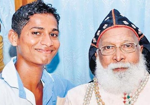 T Subramanian with Mar Chrysostom Valiya Metropolitan | File pic