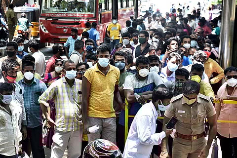 Relatives of Covid patients wait in a long queue to avail Remedesivir at Government Kilpauk Medical College in Chennai. (Photo | P Jawahar, EPS)