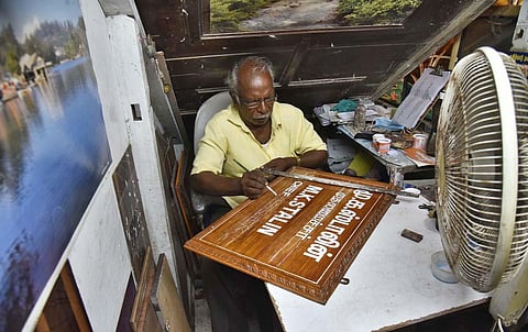 An artist readying name board identifying MK Stalin as Chief Minister, at Secretariat on Thursday . (Photo| P Jawahar, EPS)