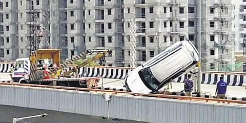 Police carry out clean-up operations after a 73-year-old man on the way to hospital died in an accident on the PVNR Expressway on Friday. (Photo| EPS)