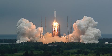 A Long March 5B rocket carrying a module for a Chinese space station lifts off from the Wenchang Spacecraft Launch Site in Wenchang. (Photo| AP)