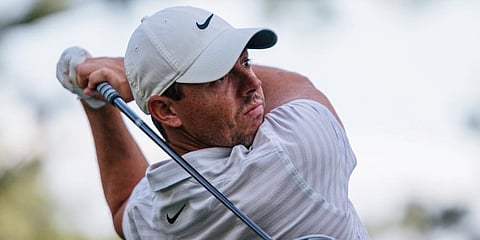 Rory McIlroy watches his tee shot on the 18th hole during the third round of the Wells Fargo Championship golf tournament at Quail Hollow. (Photo | AP)