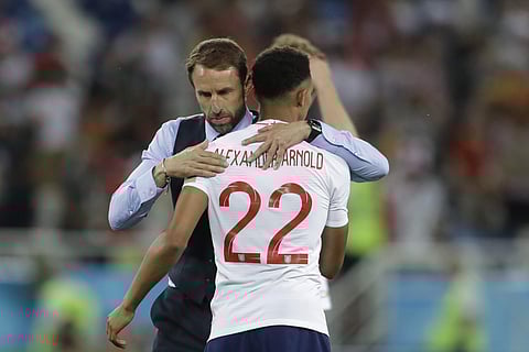 England head coach Gareth Southgate hugs England's Trent Alexander-Arnold. (File Photo | AP)