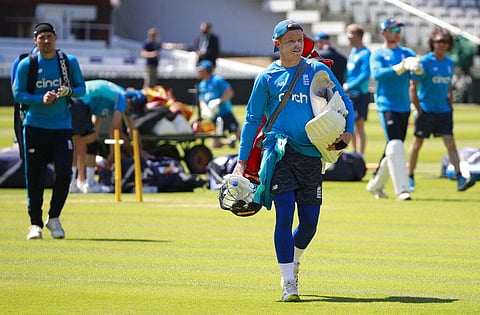 England's Ollie Pope walks across the field during a practice session at Lord's Cricket Ground in London. (Photo | AP)