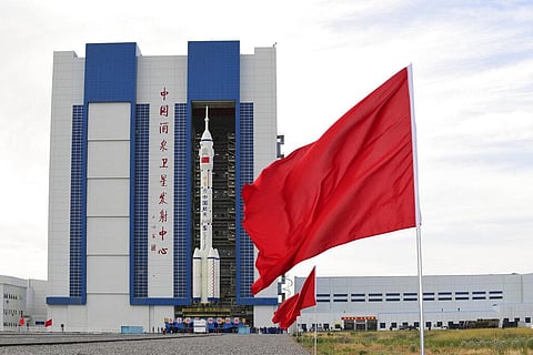 The  Shenzhou-12 manned spaceship with its Long March-2F carrier rocket is being transferred to the launching area of Jiuquan Satellite Launch Center in China. (Photo | AP)