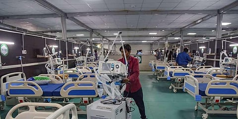 Preparation of 300-bedded COVID hospital by State Government and DRDO at Indira Gandhi Stadium, Sarusajai in Guwahati. (Photo | PTI)