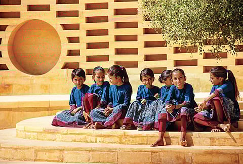 Schools girls in the uniform designed by Sabyasachi Mukherjee;