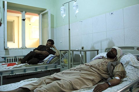 Injured workers of HALO Trust de-mining organization are treated at a hospital in northern Baghlan province, Afghanistan. (Photo | AP)