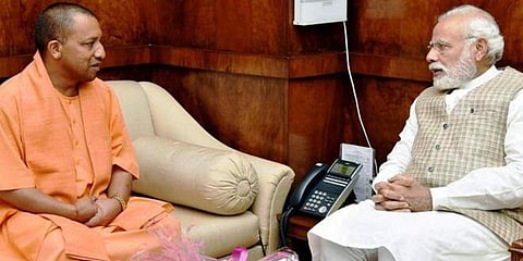PM Narendra Modi (R) with Uttar Pradesh CM Yogi Adityanath (File Photo | PTI)