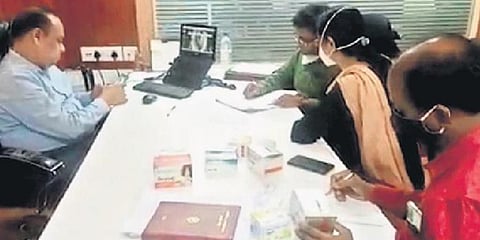 Officials of the directorate verifying records and samples of the seized medicines in Cuttack. (Photo | EPS)
