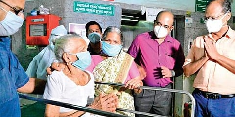 Janakiyamma thanks doctors as she gets discharged from Pariyaram Medical College Hospital. 