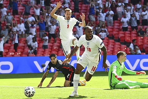 England's Raheem Sterling celebrates after scoring his side's opening goal during the Euro 2020 soccer championship group D match. (Photo | AP)