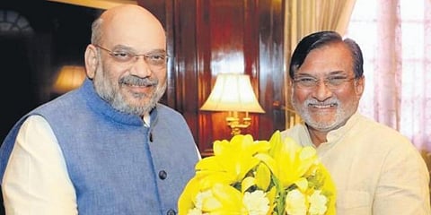 Union minister Amit Shah (L) and Lakshadweep administrator Praful Patel. (Photo| EPS)