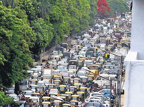 There was bumper-to-bumper traffic near Town Hall in Bengaluru after lockdown restrictions were eased on Monday | Shriram BN
