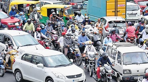 With some relaxations made to lockdown norms, vehicles seen caught in a traffic jam on NR Road, near Town Hall, in Bengaluru on Monday | VINOD KUMAR T 