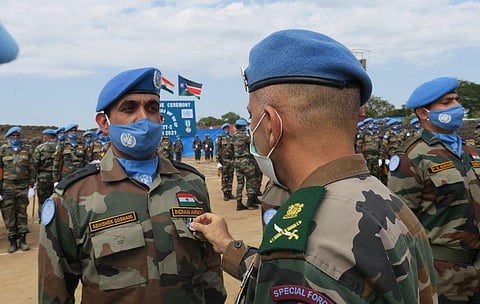 UN Force Commander Lt Gen Tinaikar giving away medal to an Indian Army soldier in Bor ( Photo | United Nations) 
