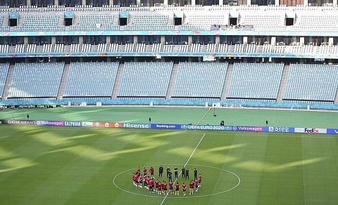 Turkey's manager Senol Gunes, center, gives instructions to his players during a team training session at the Baku Olympic Stadium in Baku. (Photo | AP)
