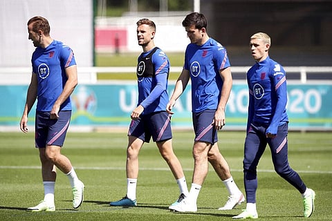 From left, England's Harry Kane, Jordan Henderson, Harry Maguire and Phil Foden walk, during a training session at St George's Park. (Photo | AP)