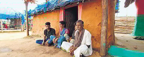 Chandran with his parents at his hut in Sundaipodu village of Erode district | Express