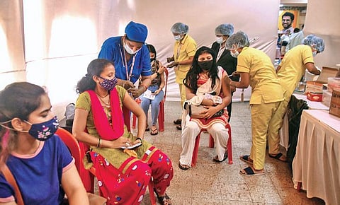 Women take the jabs at a vaccination centre in Mumbai on Tuesday | Pti