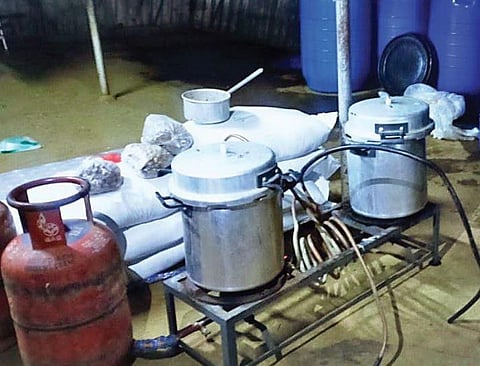 The utensils Sampathkumar used to brew arrack at home | Express