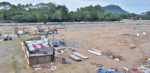 Exhibition material being removed from the PWD grounds where government is planning to contruct Ambedkar Smriti Vanam, on Wednesday I P Ravindra Babu