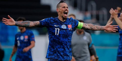 Marek Hamsik celebrates at the end of the Euro 2020 group E match between Poland v Slovakia at the Saint Petersburg stadium in St. Petersburg, Russia. (Photo | AP)