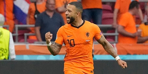 Memphis Depay of the Netherlands celebrates after scoring his side's opening goal during the Euro 2020 group C match between The Netherlands and Austria at Johan Cruijff Arena. (Photo | AP)