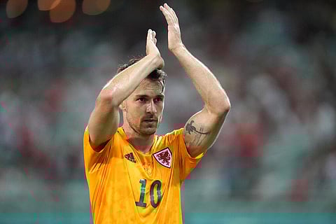 Wales' Aaron Ramsey addresses spectators during the Euro 2020 soccer championship group A match between Turkey and Wales. (Photo | AP)