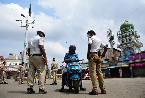 Police checking vehicles during lockdown in Bengaluru. (Photo | Ashishkrishna HP, EPS)