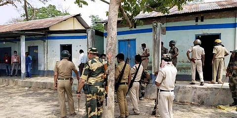 FILE | Security personnel keep vigil at a polling station after EC ordered to stop the voting exercise at polling station number 126 in Sitalkuchi, where clashes erupted. (Photo | PTI)