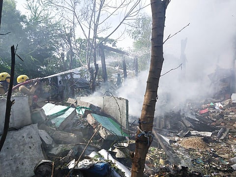 Fire Department personnel control the blaze at the house where a blast took place during cracker manufacturing in Sattur. (Photo | Express)
