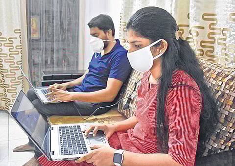Image of people working from home used for representational purpose.