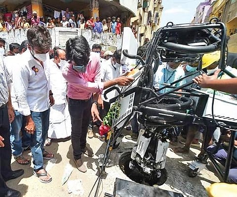 The robotic cleaning machine introduced at Chepauk Constituency doing a demonstration  | Express