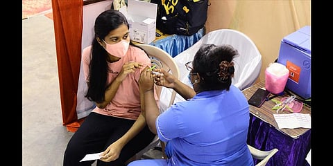 A health worker adminsters vaccine to people at the free vaccination camp conducted at Don Bosco School, Egmore, in Chennai on Saturday. (Photo | Debadatta Mallick, EPS)