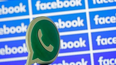 A 3D printed Whatsapp logo is seen in front of a displayed Facebook logo in this illustration taken April 28, 2016. (File Photo | Reuters)