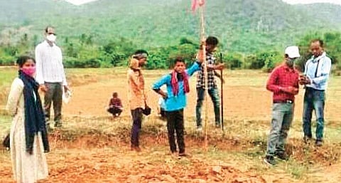 Rayagada tehsildar at site of pond renovation by AP workers in Champapur village I Express