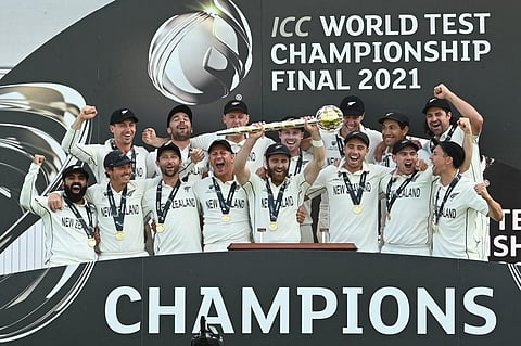New Zealand's captain Kane Williamson (C) lifts the winner's Mace as players celebrate victory of the World Test Championship against India at Ageas Bowl, Southampton, England on June 23. (Photo | AFP