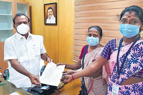 Members of the National Domestic Workers Movement submitting a memorandum to Tamil Nadu Labour Minister C V Ganesan | Express