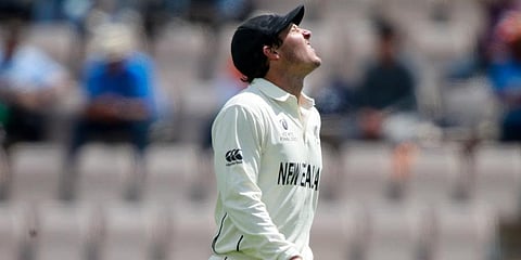 New Zealand wicketkeeper BJ Watling reacts in pain after getting hurt in an attempt to catch the ball during the sixth day of the WTC final match against India, at the Rose Bowl. (Photo | AP)