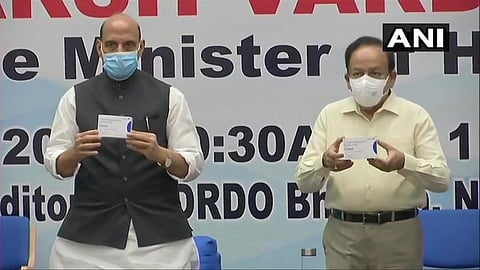 Defence Minister Rajnath Singh and Union Health Minister Dr Harsh Vardhan releasing the first batch of Anti-COVID drug 2DG developed by DRDO (File photo | ANI)