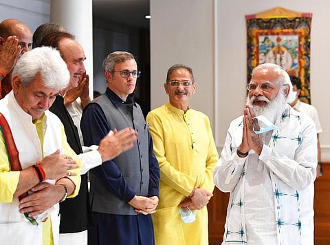 Prime Minister Narendra Modi, right, greeting members of various political parties before the start of their meeting in New Delhi. (Photo | AP)