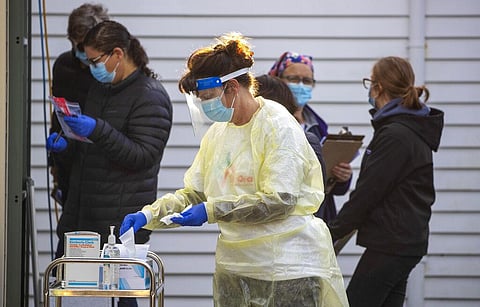 A nurse prepares to test people at a COVID-19 testing station in Wellington, New Zealand, Thursday, June 24, 2021. (Photo | AP)