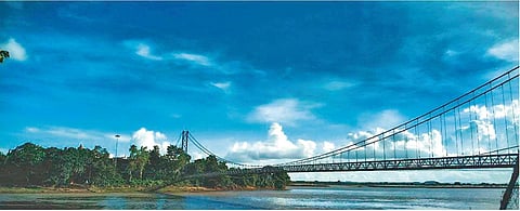 Cumulus clouds hover over the suspension bridge on Mahanadi river. (File Photo | EPS)